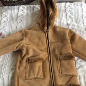 Polyester warm on the inside with a hood